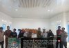 Babinsa Serma Edi Dampingi Penyaluran BLT untuk 10 KPM di Ulu Maras