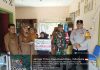 Babinsa Sertu Olih Solih Dampingi Penyaluran BLT DD, 26 KPM Terima Bantuan