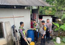 Hari Lalu Lintas ke-71, Satlantas Polres Natuna Salurkan Air Bersih untuk Warga Sebadai Ulu